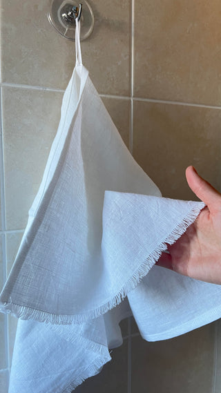 Mīkstināta lina dvielis baltā krāsā