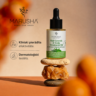 Marusha Rozmarīna eļļa matiem uz akmens un ar norādi, ka klīniski pierādīta efektivitāte un ka dermatoloģiski testēta.