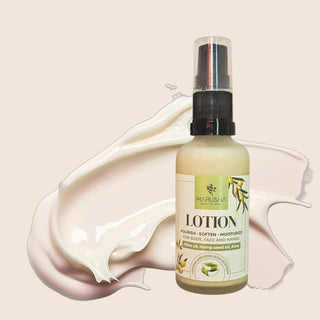 Marusha lotion bottle with a droplet of lotion on a beige background