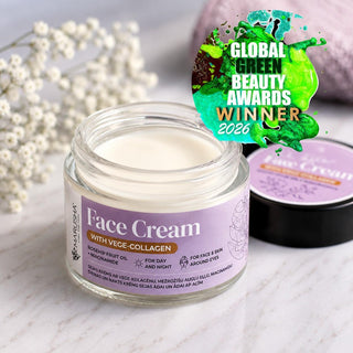 A jar of HairScape Face Cream with Vege-Collagen is shown on a marble surface with white flowers and a second jar in the background. A green and gold 'Global Green Beauty Awards Winner 2026' badge is overlaid in the top right.