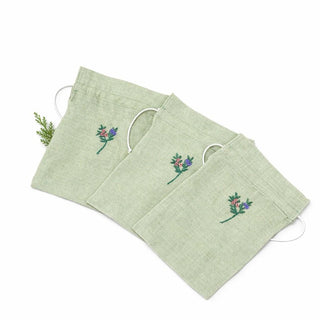 Zaļš un elegants lina auduma dāvanu maisiņš un somiņa