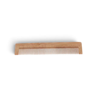 A light natural wood comb with fine teeth, shown horizontally on a clean white background.